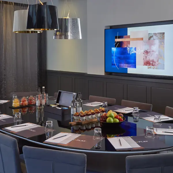 Dining room table with wall-mounted television