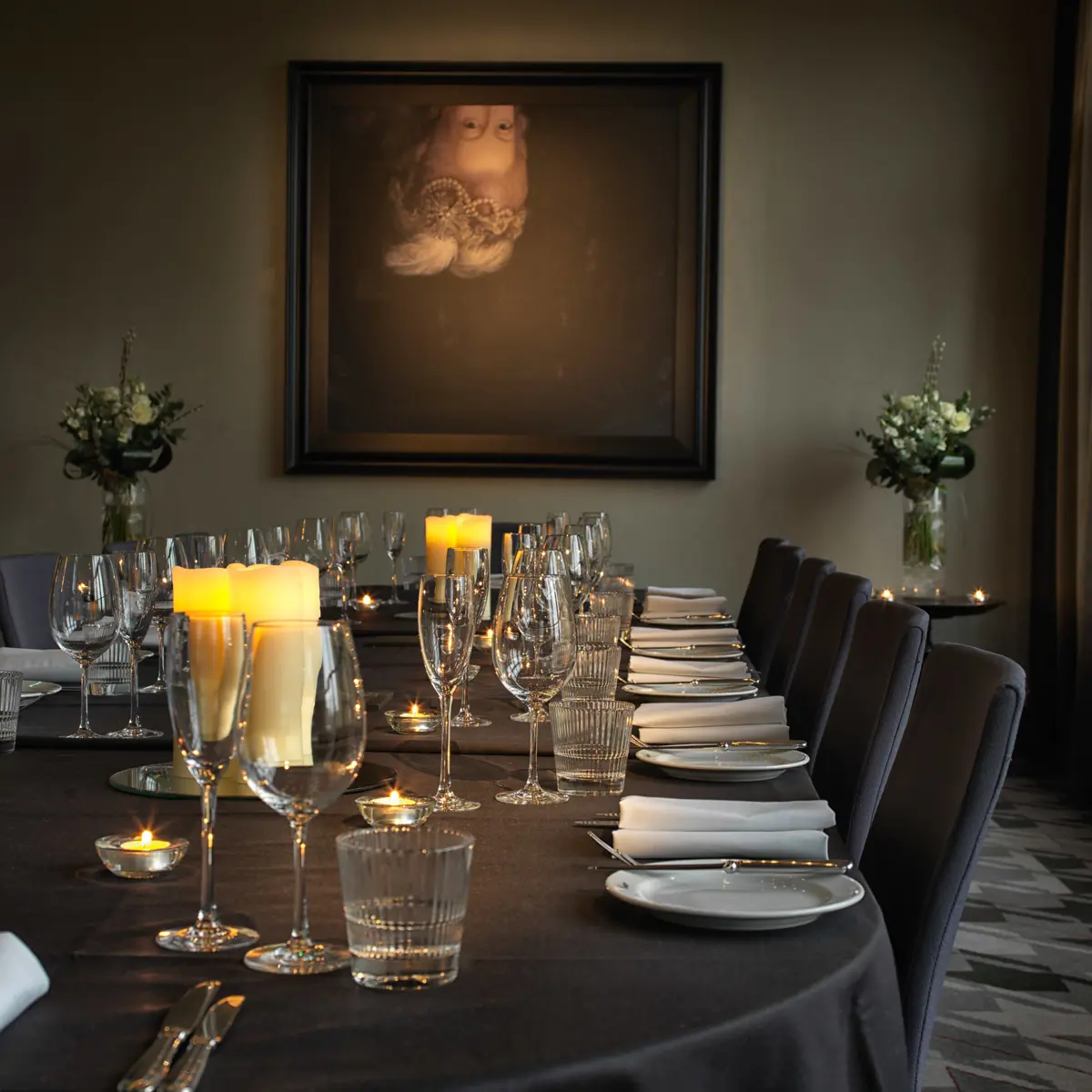 A table adorned with neatly arranged place settings.