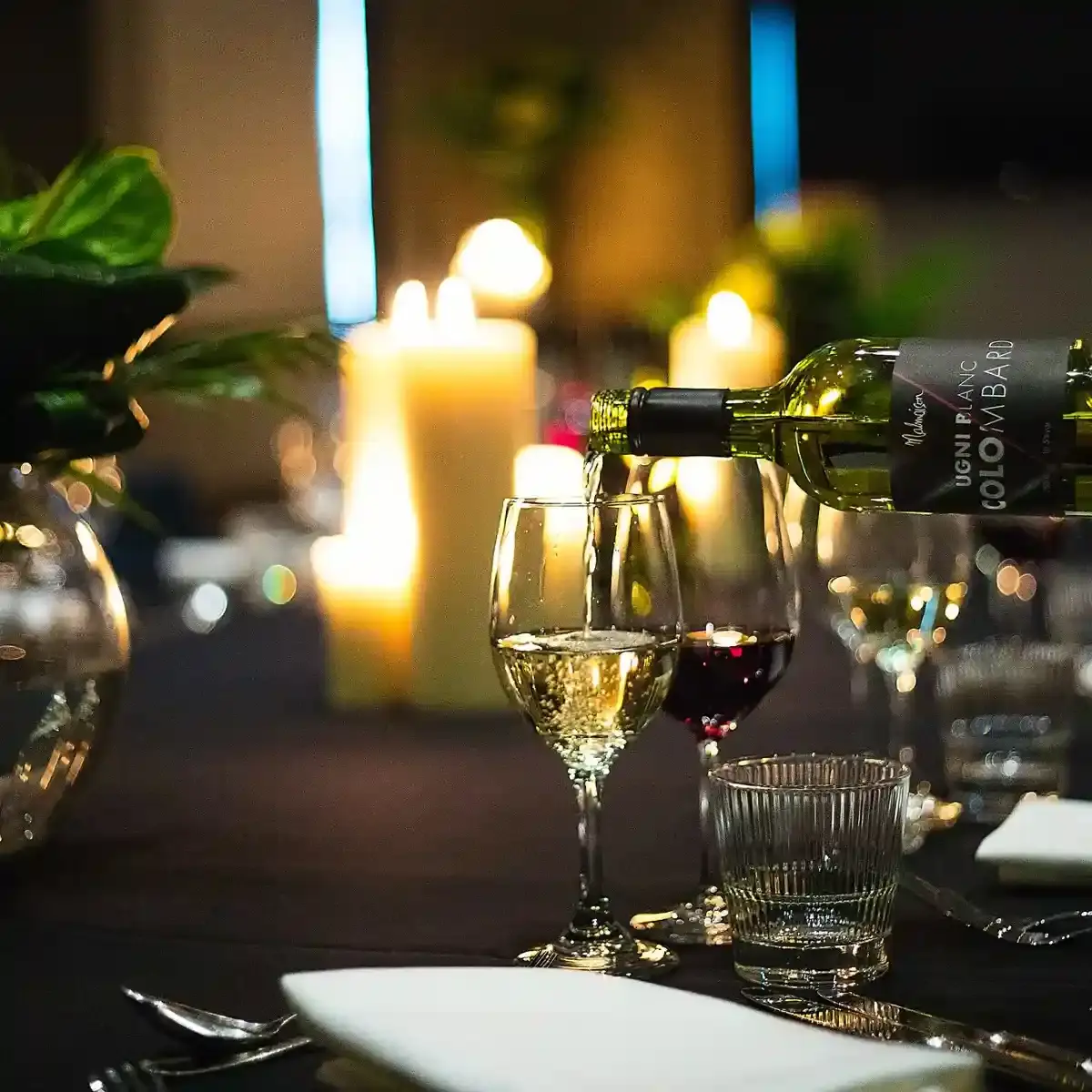 Malmaison Birmingham Private Dining A person pouring wine into a glass.