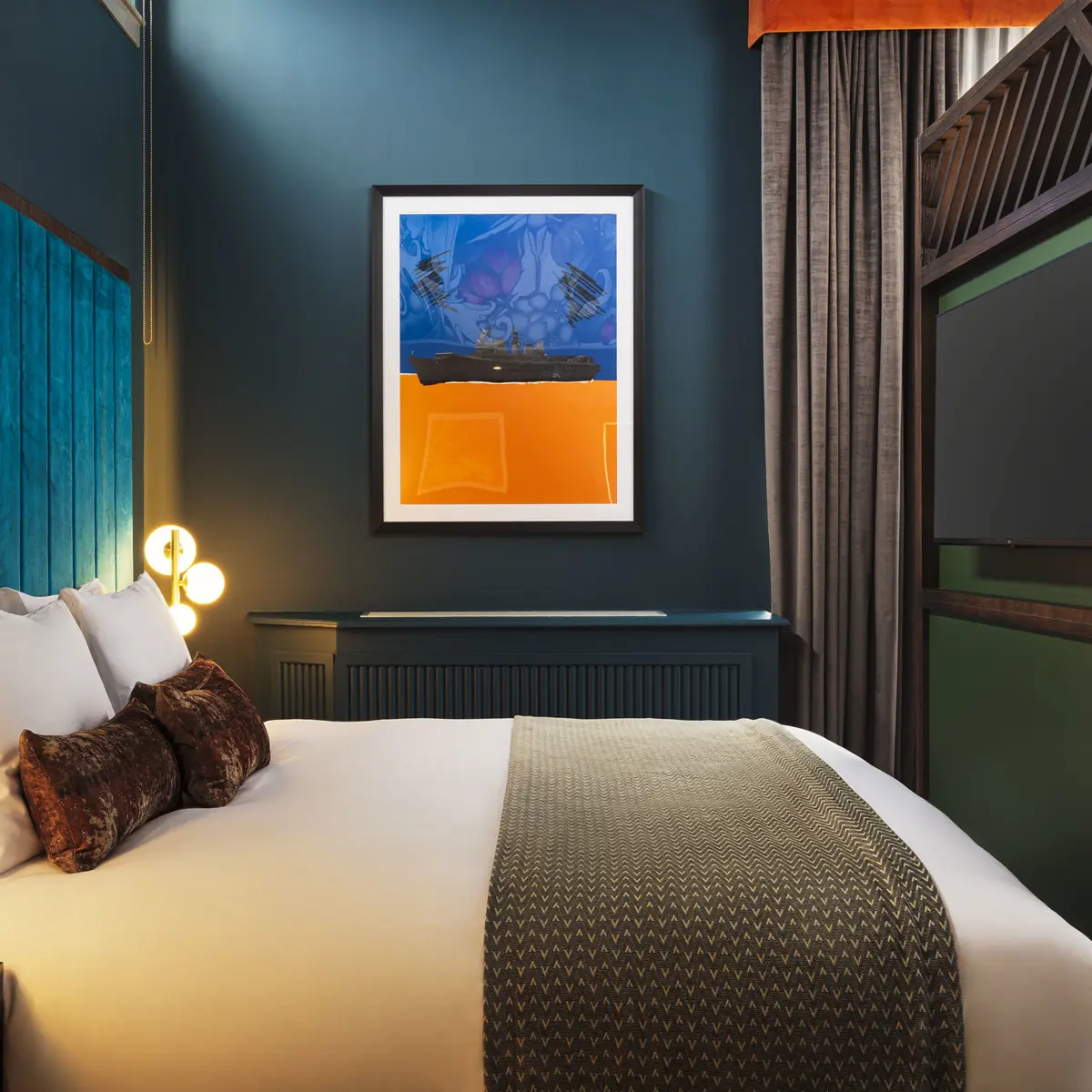 A bedroom featuring a wall-mounted tv.