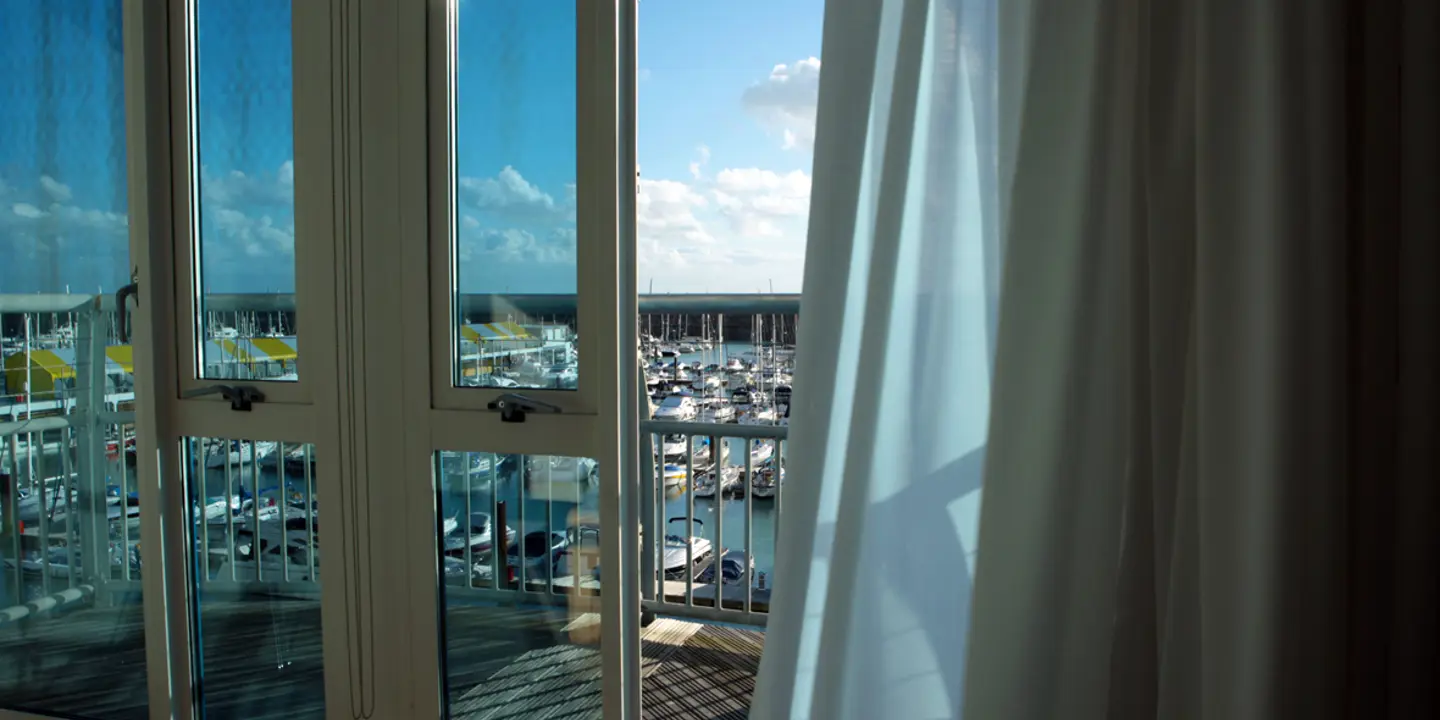 View of a marina through a window.
