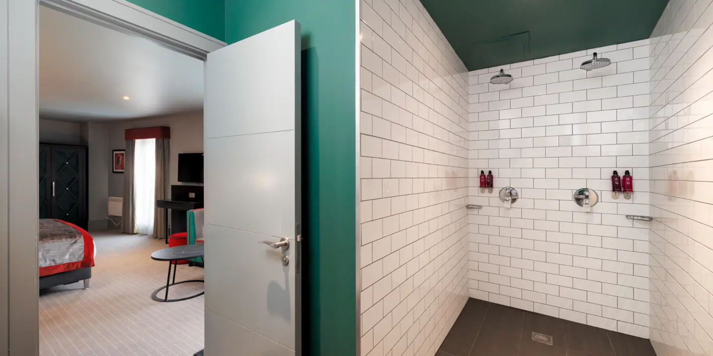 Bathroom featuring a sink and shower.