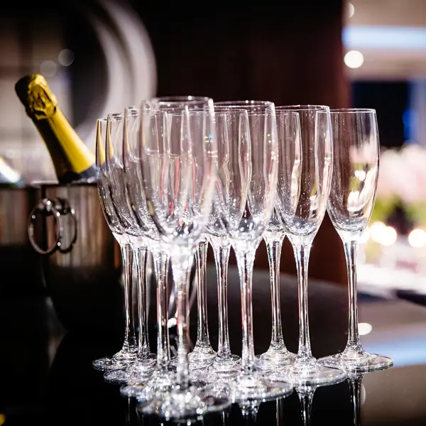 Champagne glasses arranged neatly on a table