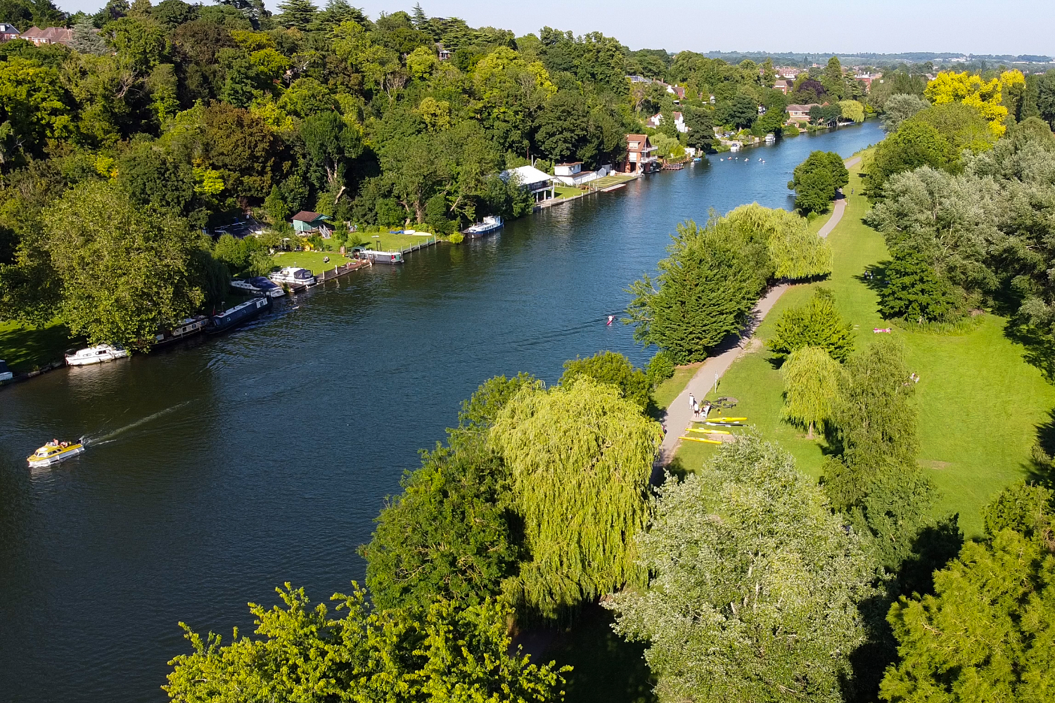 An impressive stone building featuring elegant arched windows.